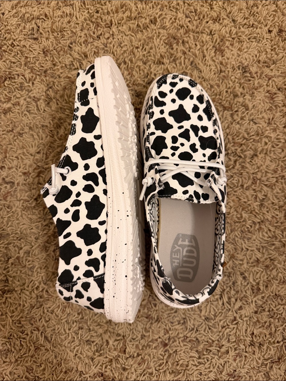 Hey Dude NWOT Cow-Print Slip-On Sneakers in Black & White